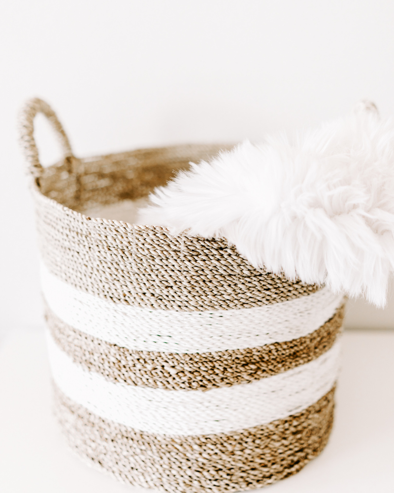 basket with white feathers